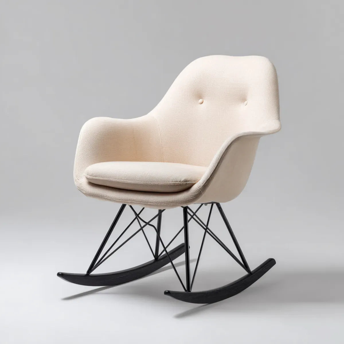 Fauteuil à bascule rembourré crème avec piètement noir en acier 67 x 72 x 94 cm